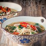Nothing could be simpler than this Asian Style Leftover Chicken Soup made with leftover roast chicken and a host of Asian flavours with a punch of chili! This super quick weeknight supper recipe is ready in 20 minutes. #chickensoup #leftoverchicken
