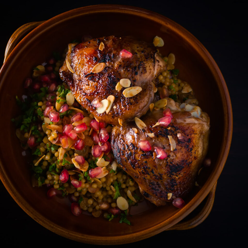 Pomegranate Chicken Thighs with Israeli Cous Cous | Krumpli