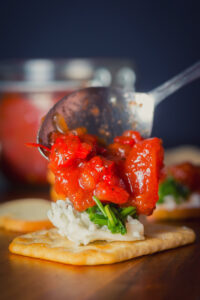 This tomato and Chili Jam is so versatile, every thing from a topping to Crostini through to a glaze for pork or chicken.