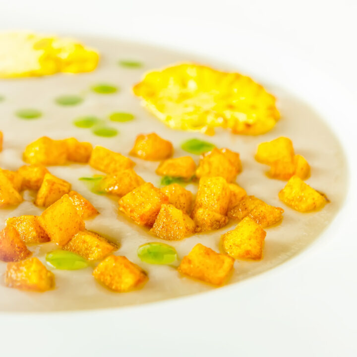 This delicious Cauliflower Veloute with Turmeric Potatoes is a soup that combines classic French techniques with Indian flavours.