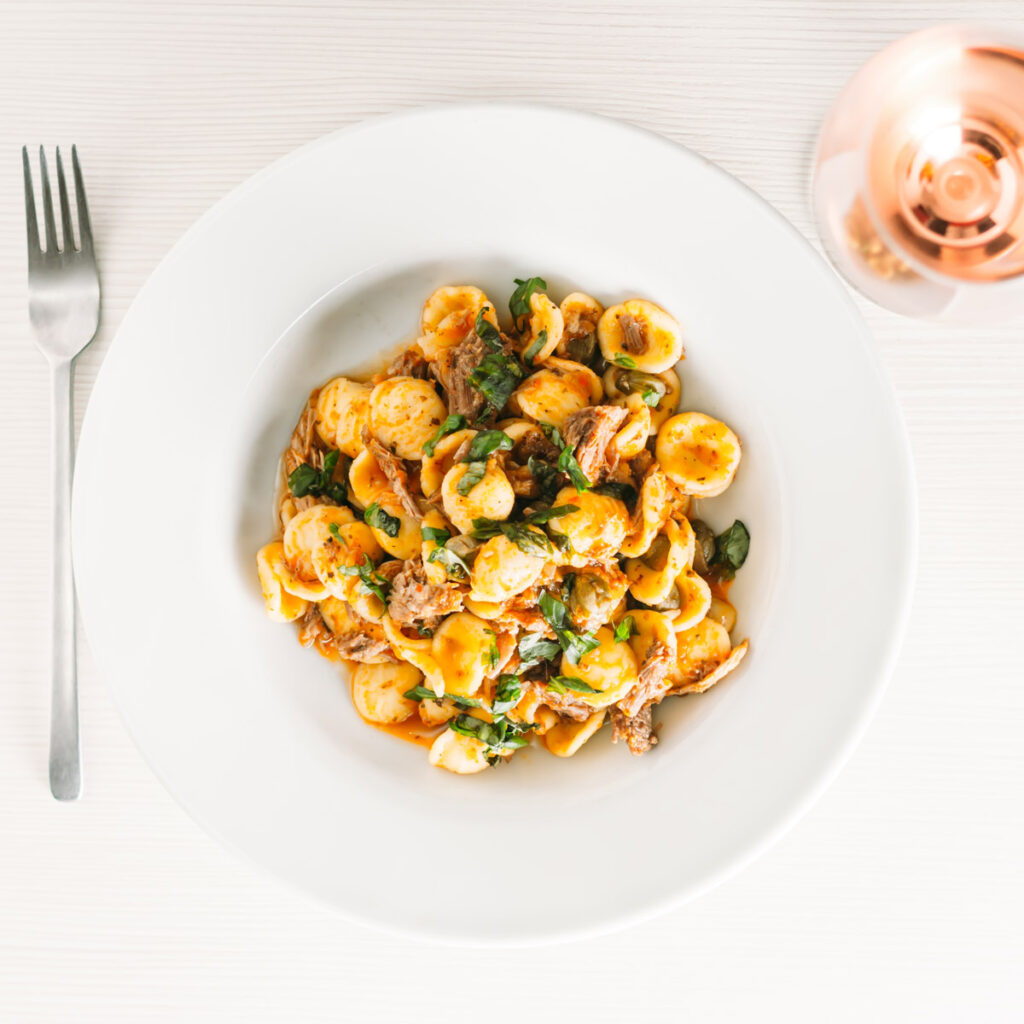 InstantPot Pork Ragu With Orecchiette Pasta Pork Ragu that tastes like it has been slow cooked for 24 hours in an hour or so thanks to the InstantPot served with hearty Orecchiette Pasta.
