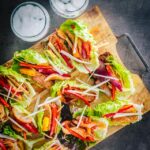 These Stir Fried Stir Fried Spicy Pineapple Pork Lettuce Wraps are super quick to cook and a real crowd pleaser, 20 minutes prep and 10 minutes to cook!