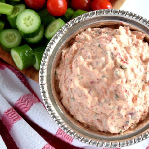 Cool, creamy, smoky, yet cheesy, fresh, and vibrant all make this Creamy Roasted Red Pepper Dip perfect dip to accompany any crudité.