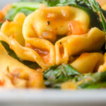 This tortellini soup is a hearty main course style soup that is crazy quick to make, a perfect midweek pantry "lifesaver" full of great flavours!