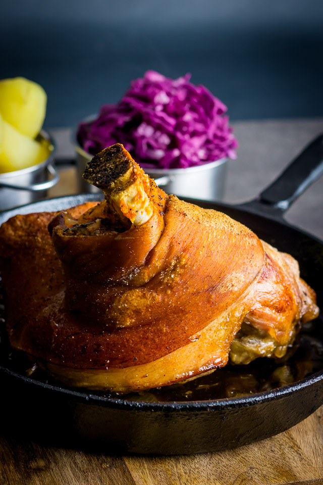 Crispy Beer Roasted Pork Knuckle With Red Cabbage Popular across all of central Europe my version of beer roasted pork knuckle has definite Hungarian leanings with dark beer and caraway seeds.