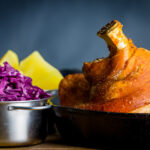 Popular across all of central Europe my version of beer roasted pork knuckle has definite Hungarian leanings with dark beer and caraway seeds.
