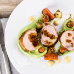 Anything wrapped in bacon is awesome so this simple bacon wrapped baked pork tenderloin really owns it and the whole meal is more simple than it looks. All told this can be on your table in a shade under an hour.