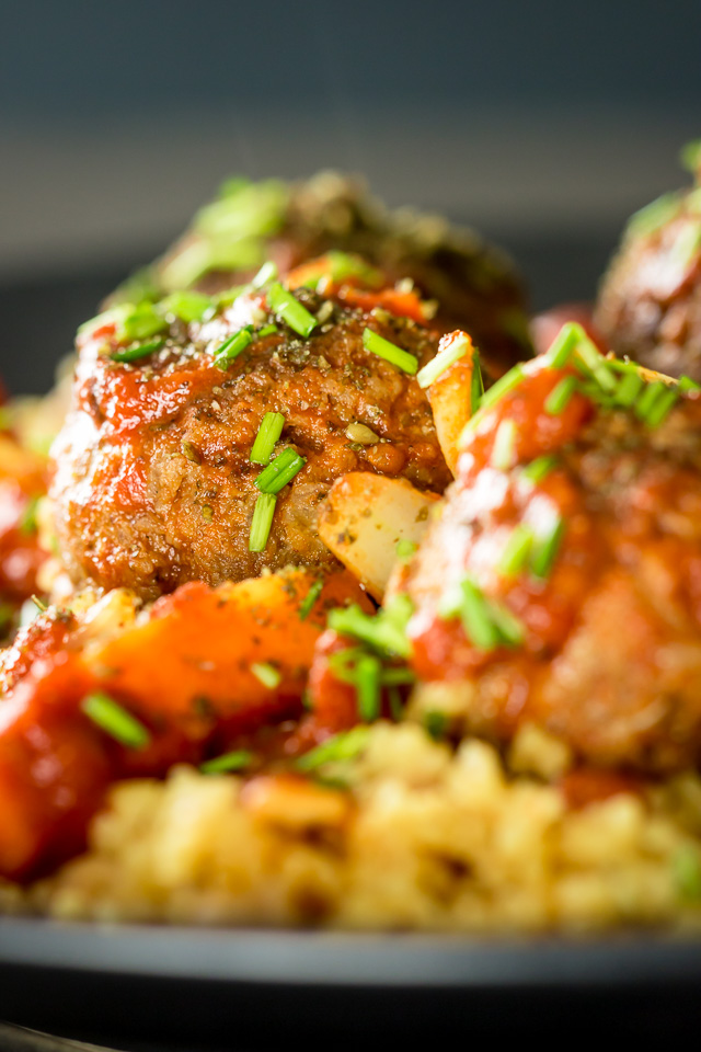 Moroccan Beef Meatballs with Bulgar Wheat and Chickpeas The bed of Harissa spiked bulgar wheat and chickpeas is the perfect bed for these Moroccan inspired beef meatballs, a wonderful winter warmer!