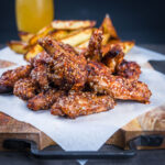 You can't beat buffalo chicken wings as finger food and these are pimped up with dates and a scotch bonnet chili in the glaze. Definitely not for the feint of heart!