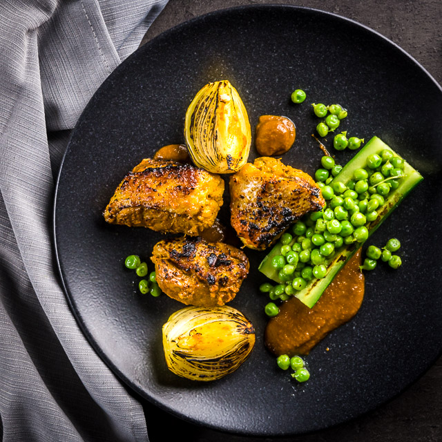 Duck Tikka Masala With Seared Cucumber and Peas Tikka Masala goes fancy with this Duck Tikka Masala beautifully grilled with a tamarind and honey sauce, cucumber and peas!