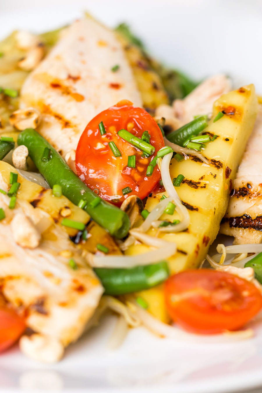 Griddled Mango Chicken Salad This mango chicken salad is the epitome of bright and zingy summer flavours but made with ingredients that are available all year round... And as for that spicy sesame oil and fish sauce dressing wow!