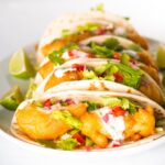 Some glorious beer battered fish tacos that are thing of great beauty, loaded with the flavours of cumin, coriander and lime!