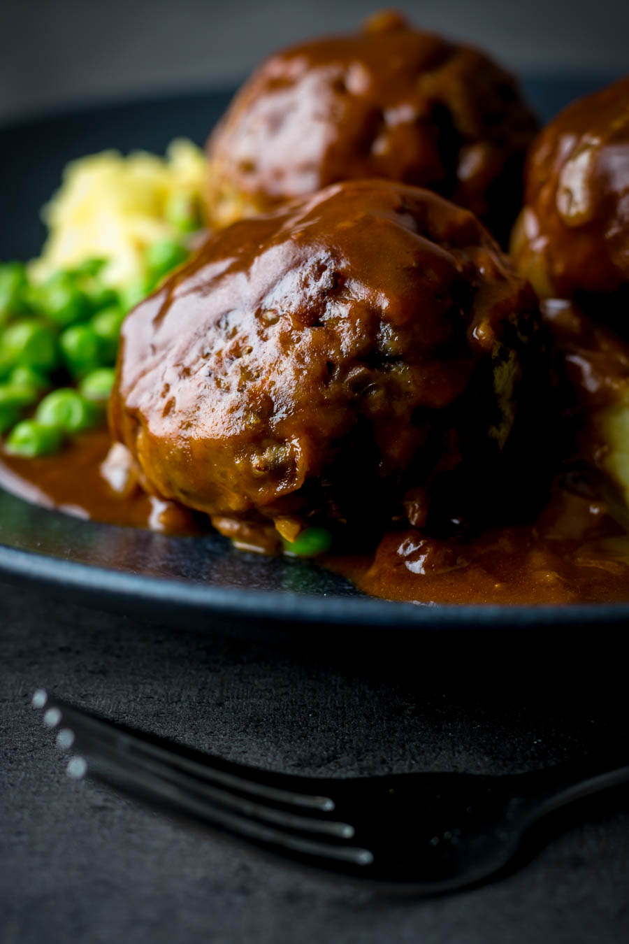 Faggots and Mash with Peas Faggots and Mash were the meatballs I grew up with a staple of the Midlands in the UK have sadly fallen out of favour but these old skool classics are still my favourite!