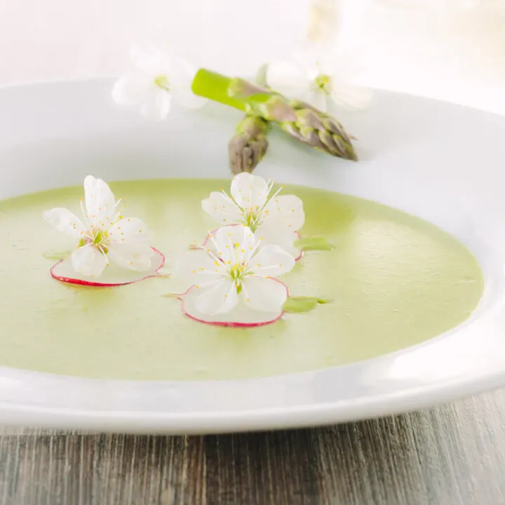 Asparagus Soup may seem a little indulgent but this cream of asparagus soup is a beautifully spring like dish with a surprising and tasty garnish.