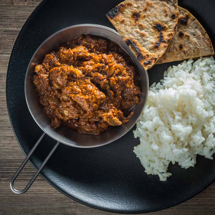 LAMB MADRAS A Madras Curry in the UK has become synonymous with a fiercely hot curry and not much else, my version has more complex flavours but still with a punch of heat from chili and pepper.