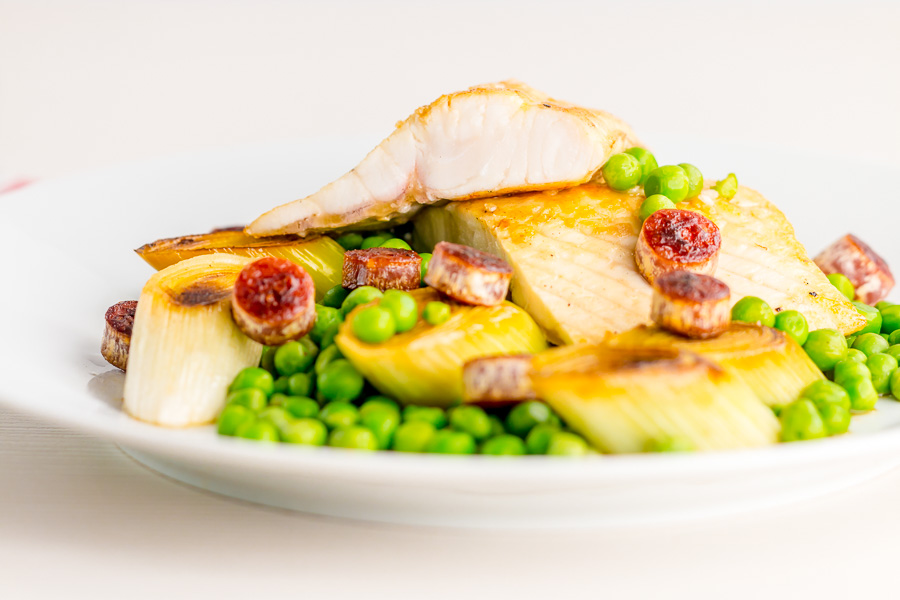 Pan Fried Cod With Peas and Leeks This Pan Fried Cod with Peas and Leeks is livened up with a little salami and represents the best of early spring for me, and the kicker is it is all ready in well under 30 minutes!