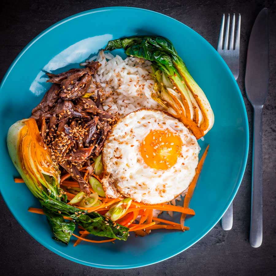 Shredded Teriyaki Duck Donburi This Shredded Teriyaki Duck Donburi is a beautiful bowl of tasty goodness, slow cooked duck leg served over rice and a host of other goodies.