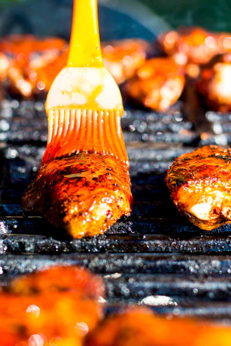 Sriracha Glazed Grilled Chicken Wings These Sriracha Glazed Grilled Chicken Wings are marinaded in a dry rub before being grilled on the BBQ in a sticky spicy sweet sauce to send them over the edge.