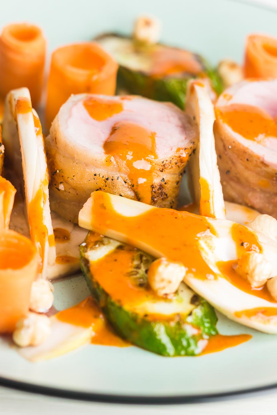 Pork Tenderloin with Pickled Fennel and Carrots This Pork Tenderloin with Pickled Fennel and Carrots recipe comes with a spicy harissa dressing and is the perfect spring/summer salad that's very un-salad like!
