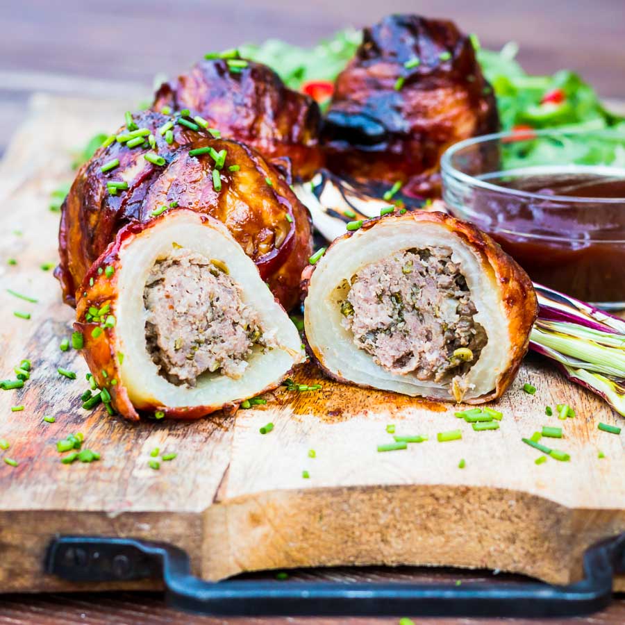 Bacon Wrapped Grilled Stuffed Onions These bacon wrapped grilled stuffed onions are insanely good, a perfect beef meatball stuffed inside an onion, then wrapped in bacon. Grilled to perfection then glazed in BBQ sauce!