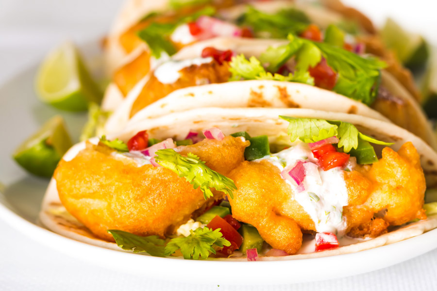Beer Battered Fish Tacos Some glorious beer battered fish tacos that are thing of great beauty, loaded with the flavours of cumin, coriander and lime!