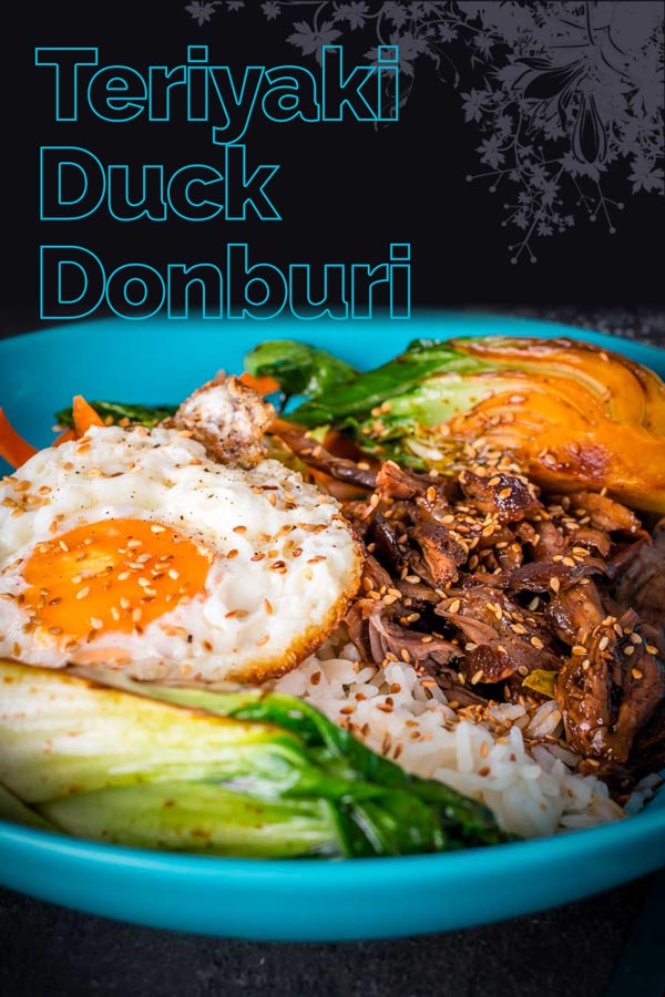 This Shredded Teriyaki Duck Donburi is a beautiful bowl of tasty goodness, slow-cooked duck leg served over rice and a host of other goodies. #duck #ducrecipe #ricebowl #dinnerfortwo #teriyaki #recipeideas #recipeoftheday #recipes