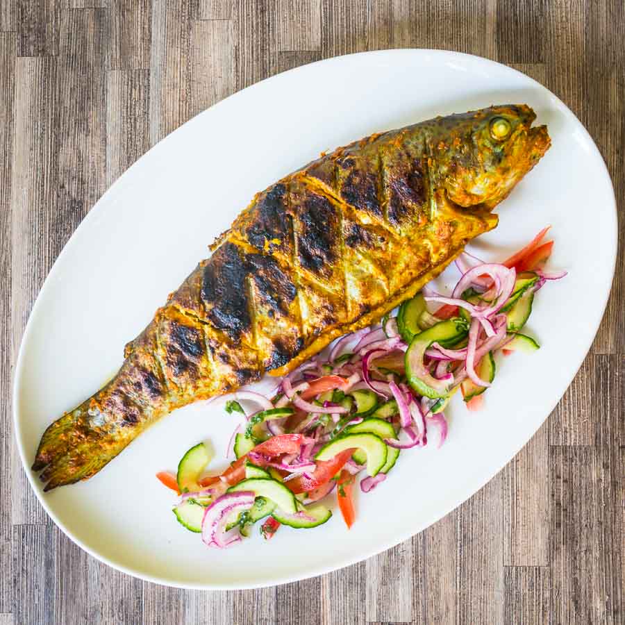 BBQ Tandoori Fish The barbecue is a great substitute for a tandoor oven as this whole BBQ tandoori fish demonstrates. A whole trout in glorious Indian Spices cooked to perfection!