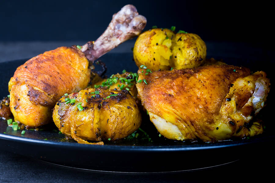 Bombay Potatoes With Chicken Legs Bombay potatoes or Bombay Aloo are the perfect side dish to these simply roasted spiced chicken legs. Spiced with Indian flavours in a dish that is not a Curry!