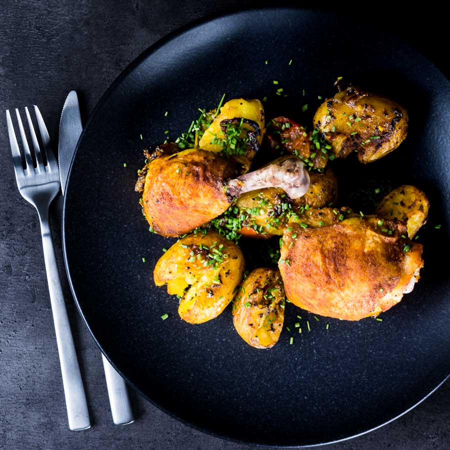 Bombay Potatoes With Chicken Legs Bombay potatoes or Bombay Aloo are the perfect side dish to these simply roasted spiced chicken legs. Spiced with Indian flavours in a dish that is not a Curry!