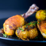 Bombay potatoes or Bombay Aloo are the perfect side dish to these simply roasted spiced chicken legs. Spiced with Indian flavours in a dish that is not a Curry!