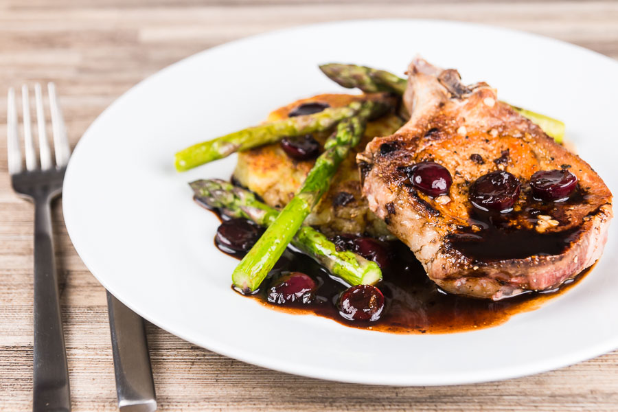 Pan Fried Pork Chops With Balsamic Cherries and Potato Rosti Simply pan fried pork chops are served with a simple potato rosti, some balsamic cherries and asparagus for an old school but delightful meal!