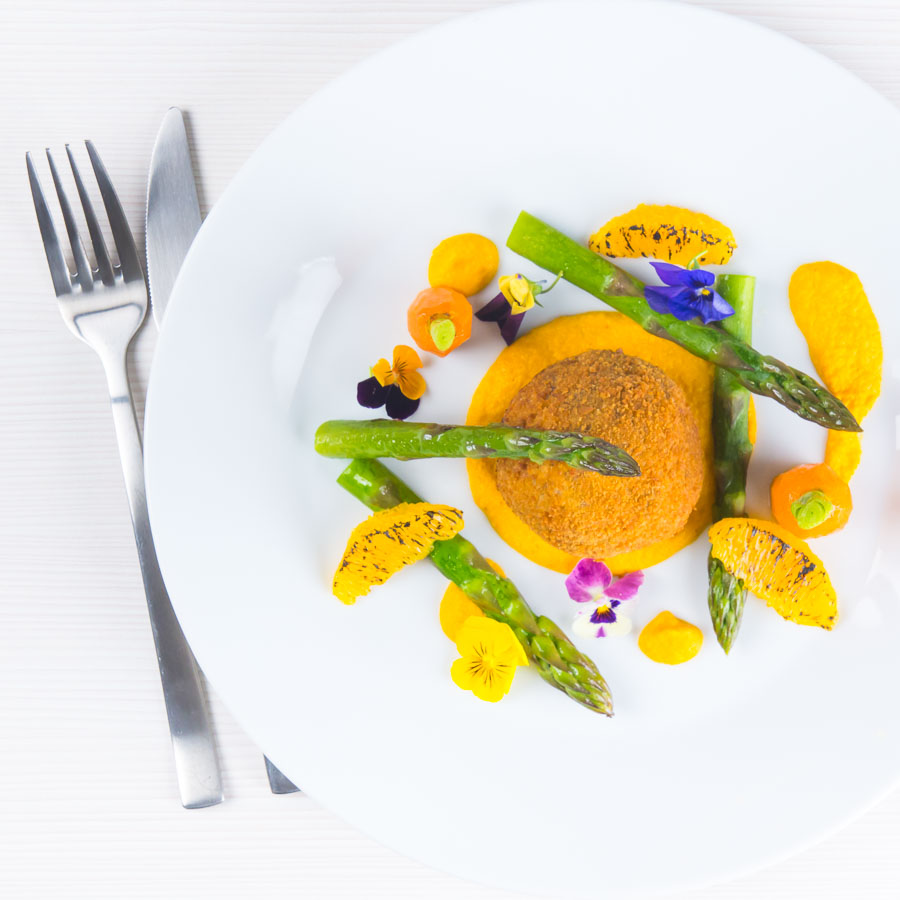 Confit Duck Leg Bonbons with Carrot Puree and Asparagus These confit duck leg bonbons are at the centre of a surprisingly light and wonderfully fancy meal featuring an orange and cumin puree and asparagus.