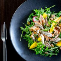 This smoked mackerel salad uses some flavourings from the east combined with mango to cut through the richness and saltiness of the smoked mackerel.