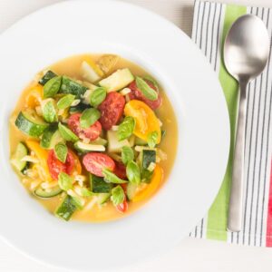 Soup is not just for winter this summer minestrone soup is a simple celebration of fresh and bright summer produce and is a great summer meal!