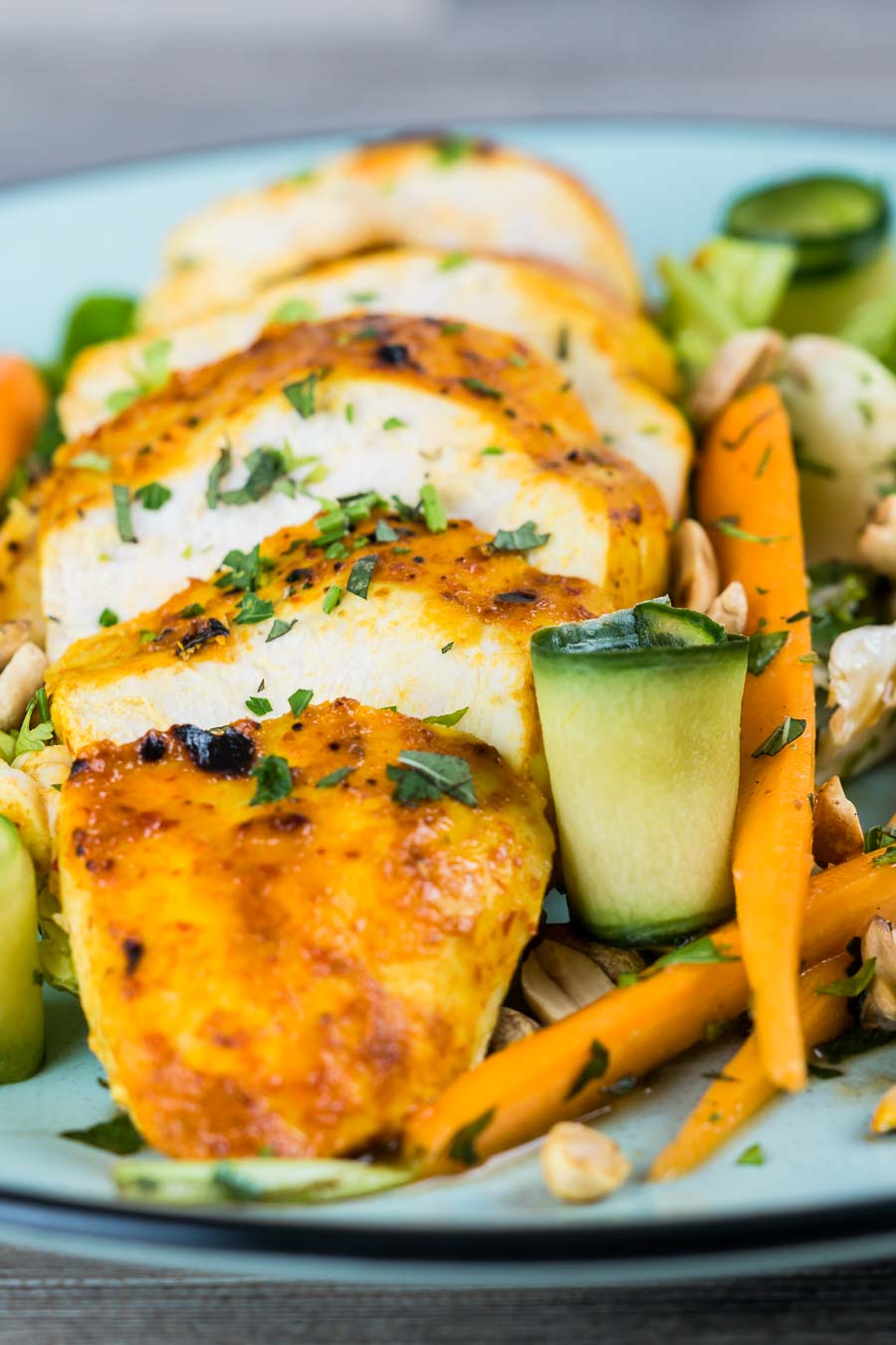 Thai Chicken Salad A simply roasted chicken breast in a Thai red curry paste and coconut milk coating form the centrepiece of this insanely tasty Thai Chicken Salad!
