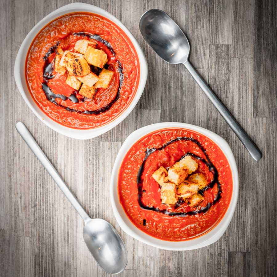 Garlicky Roasted Tomato Soup With a little bit of extra effort you can elevate a simple roasted tomato soup to a whole new taste level with hints of thyme and lots of roasted garlic.