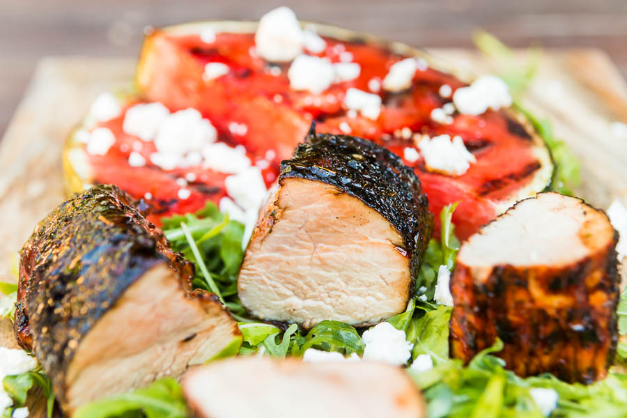 Grilled watermelon is the perfect side for this spicy glazed BBQ pork tenderloin, add a little salty feta cheese and peppery rocket and up your BBQ game!