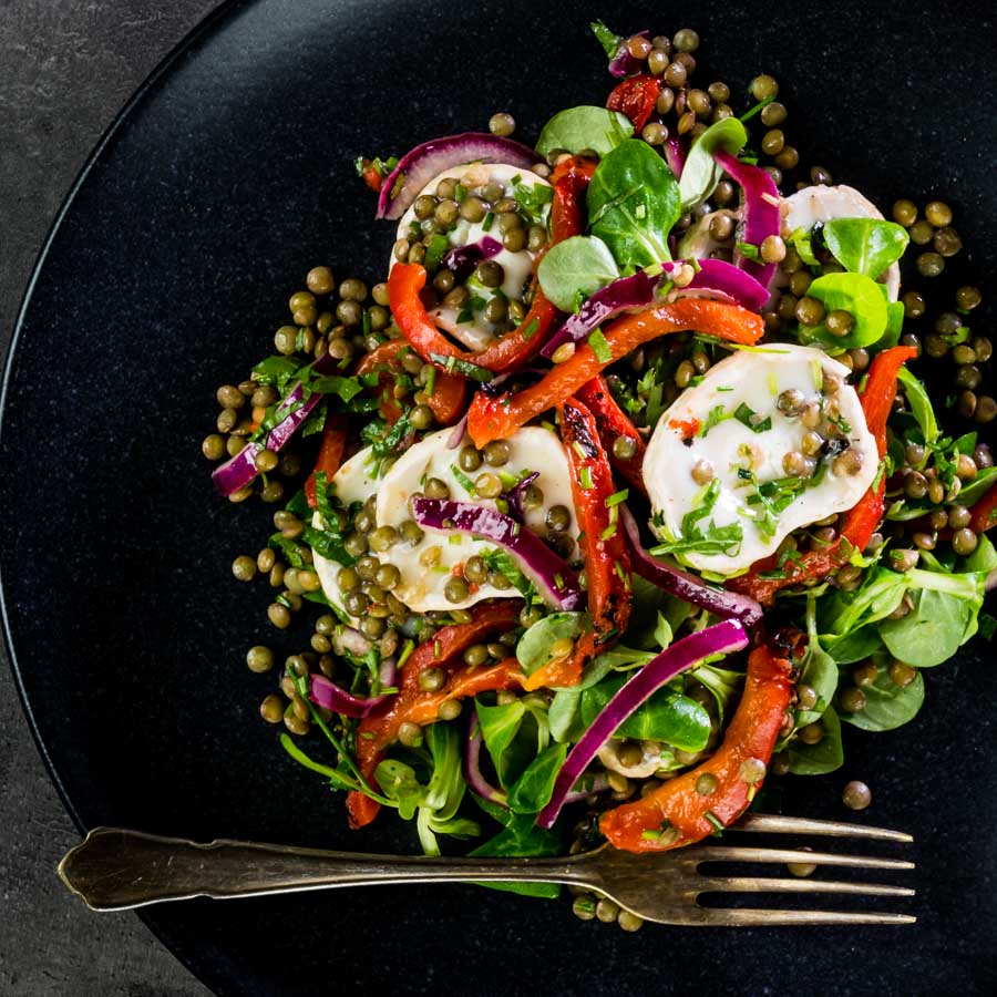 Puy Lentil Salad With Goat Cheese and Roasted Peppers This delicious puy lentil salad is loaded with gloriously salty, fresh, soft goats cheese and wonderfully sweet roasted red pepper!
