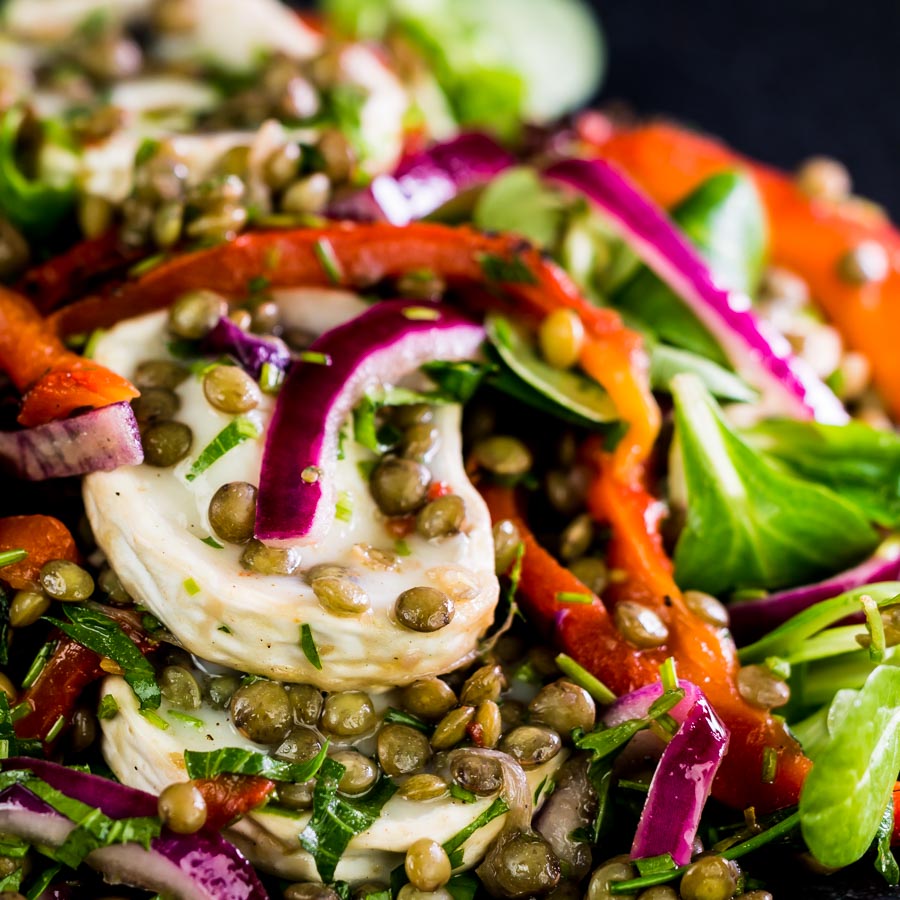 Puy Lentil Salad With Goat Cheese and Roasted Peppers This delicious puy lentil salad is loaded with gloriously salty, fresh, soft goats cheese and wonderfully sweet roasted red pepper!