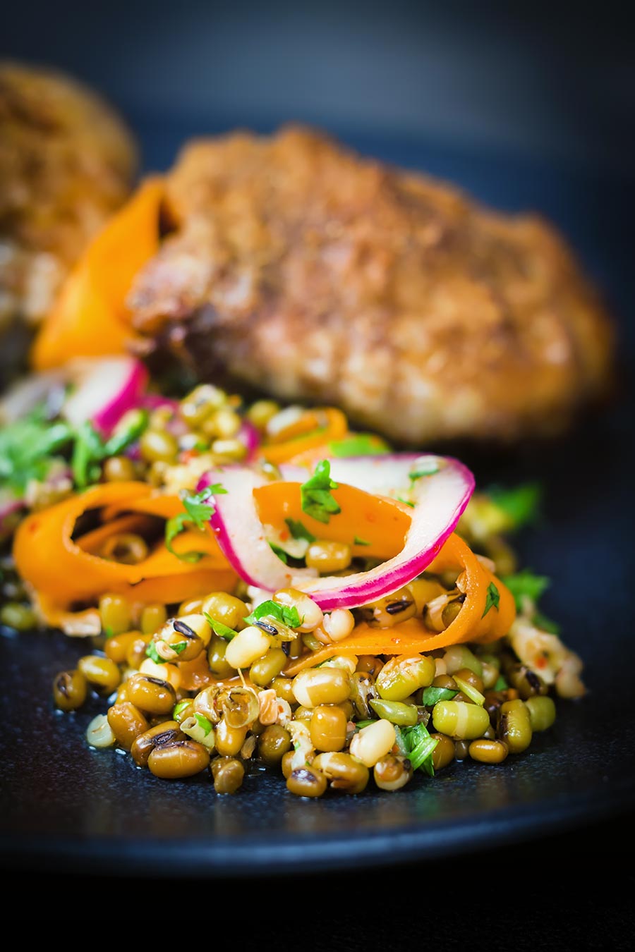 Carrot and Mung Bean Salad With Spiced Chicken Thighs This carrot and mung bean salad is bright and vibrant with the Indian Influenced pickled carrots and served with some simply roasted garam masala chicken thighs.