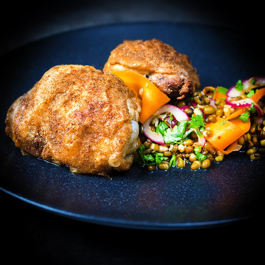 Carrot and Mung Bean Salad With Spiced Chicken Thighs This carrot and mung bean salad is bright and vibrant with the Indian Influenced pickled carrots and served with some simply roasted garam masala chicken thighs.