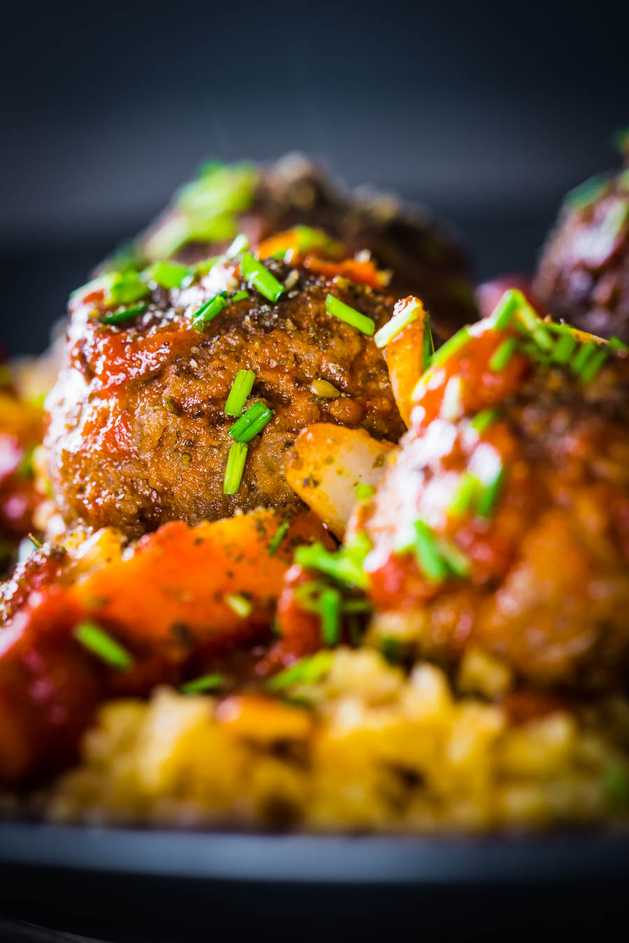 Moroccan Beef Meatballs with Bulgar Wheat and Chickpeas The bed of Harissa spiked bulgar wheat and chickpeas is the perfect bed for these Moroccan inspired beef meatballs, a wonderful winter warmer!