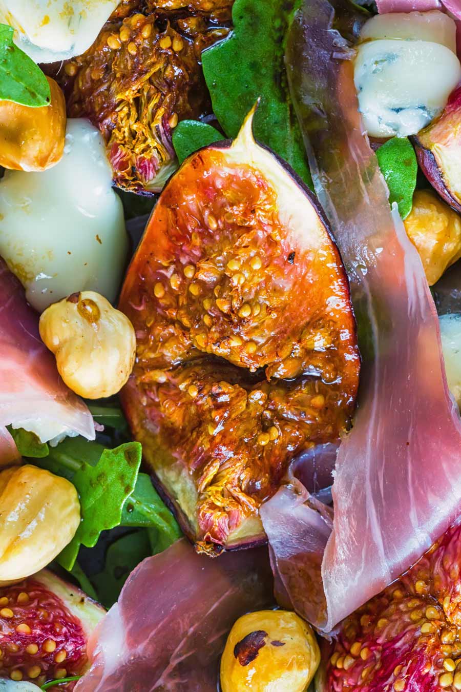 Roasted Fig Salad With Blue Cheese and Hazelnuts Figs are a gloriously diverse ingredient, my favourite way to eat them is in a roasted fig salad paired with wonderful blue cheese and hazelnuts!