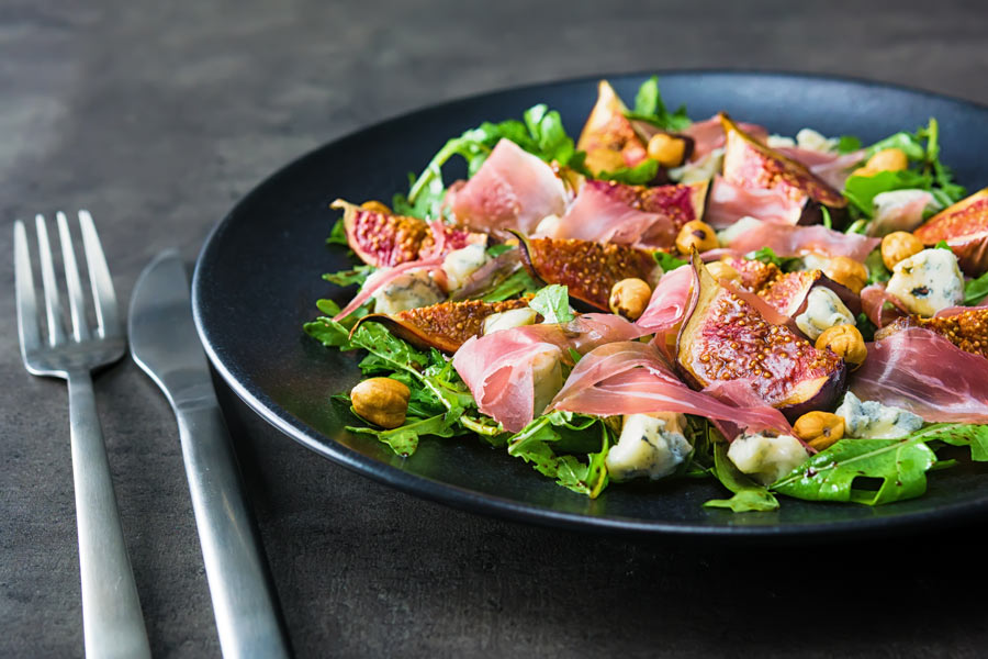 Roasted Fig Salad With Blue Cheese and Hazelnuts Figs are a gloriously diverse ingredient, my favourite way to eat them is in a roasted fig salad paired with wonderful blue cheese and hazelnuts!
