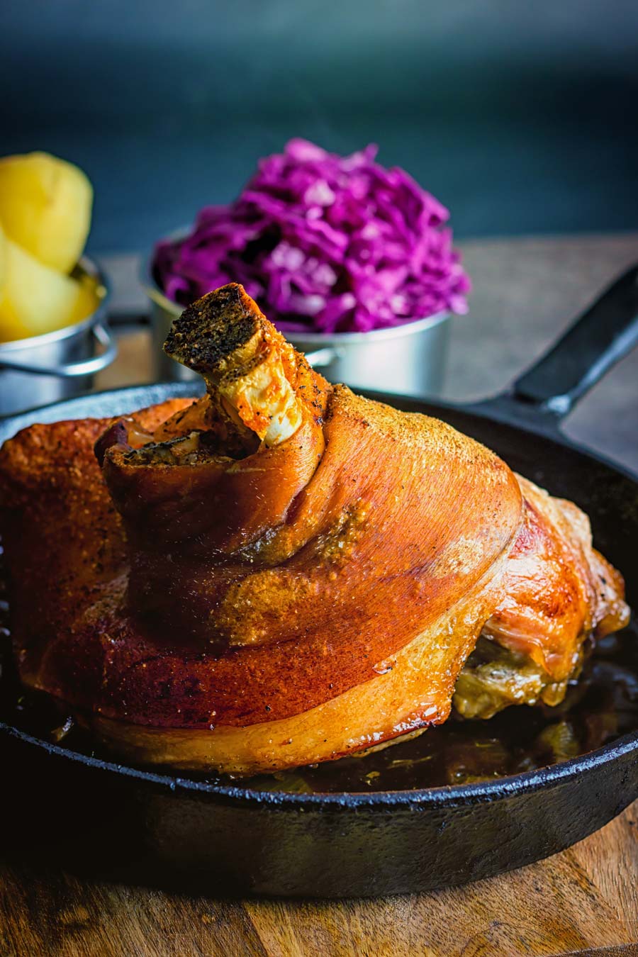 Crispy Beer Roasted Pork Knuckle With Red Cabbage Krumpli