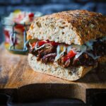 This soft and wonderfully flavoursome BBQ pulled beef is cooked in the Instant Pot and served with a quickened Hungarian pickled cabbage csalamádé.