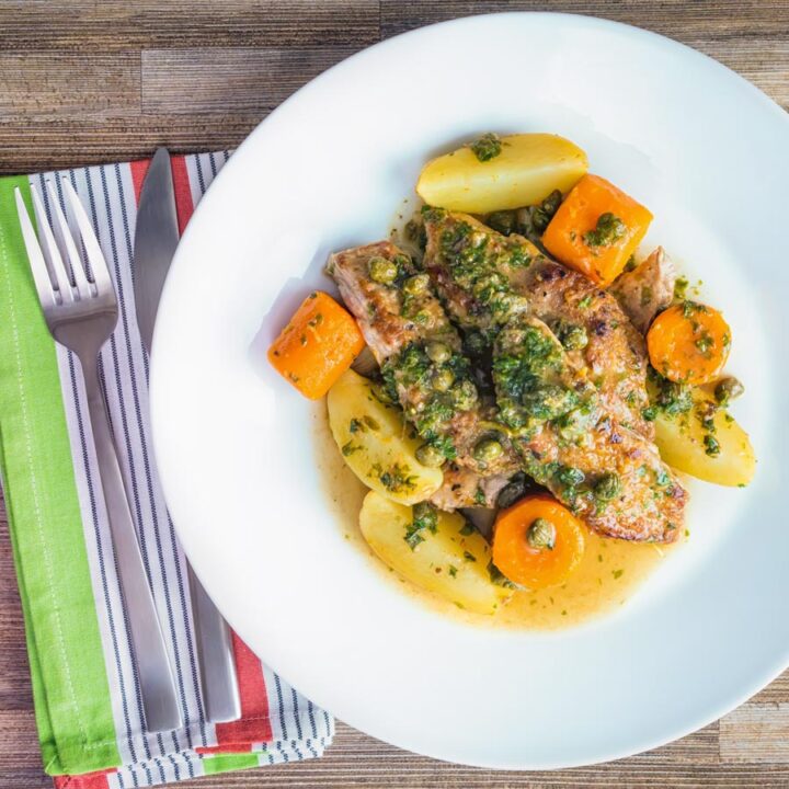 Veal scallopini takes a wonderful piece of veal escalope and combines it with a vibrant wine, caper and lemon sauce to create a delicious simple meal!