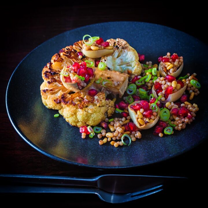 Cauliflower is my favourite winter vegetable and this exotic 'Persian' influenced Roasted Cauliflower Steak light and bright break from winter and makes for a fantastic complete vegan meal!