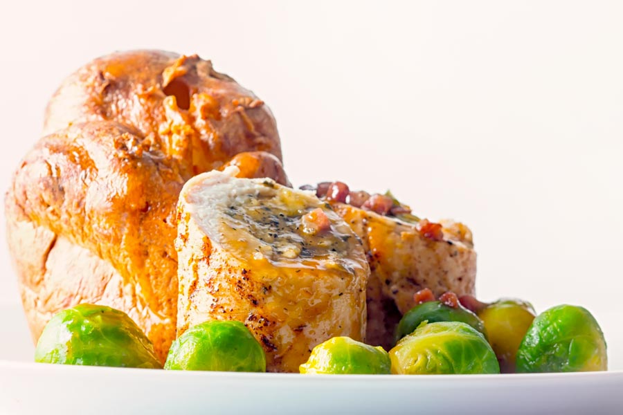This Poached Sage and Onion Stuffed Chicken Breast recipe and is a lightened up and hurried up take on a traditional British chicken dinner.