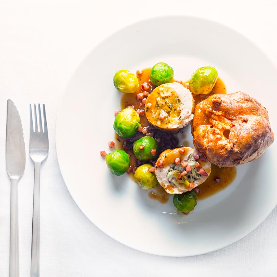 This Poached Sage and Onion Stuffed Chicken Breast recipe and is a lightened up and hurried up take on a traditional British chicken dinner.